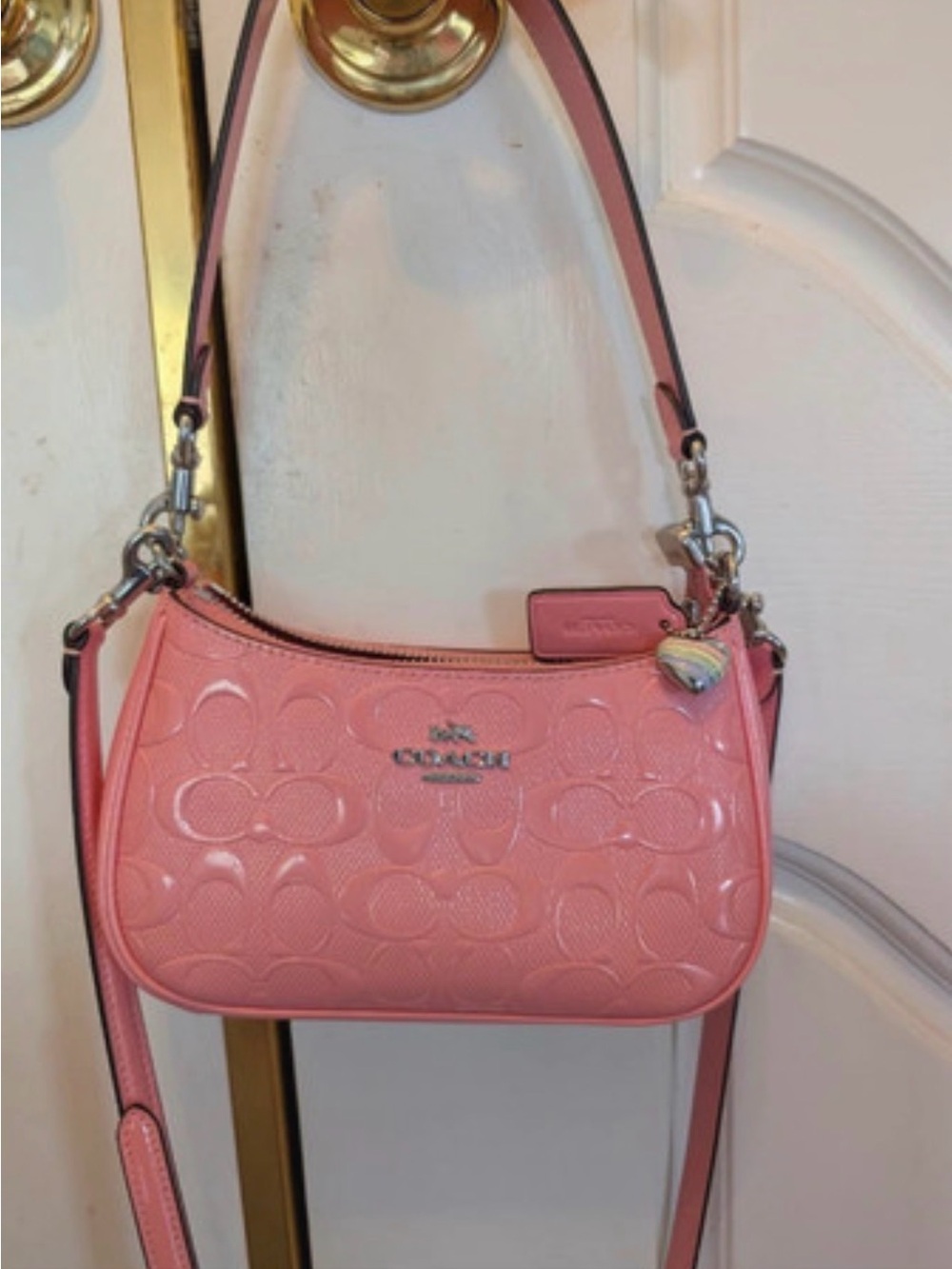 Coach Pink Signature Embossed Leather Crossbody Bag with Heart Charm